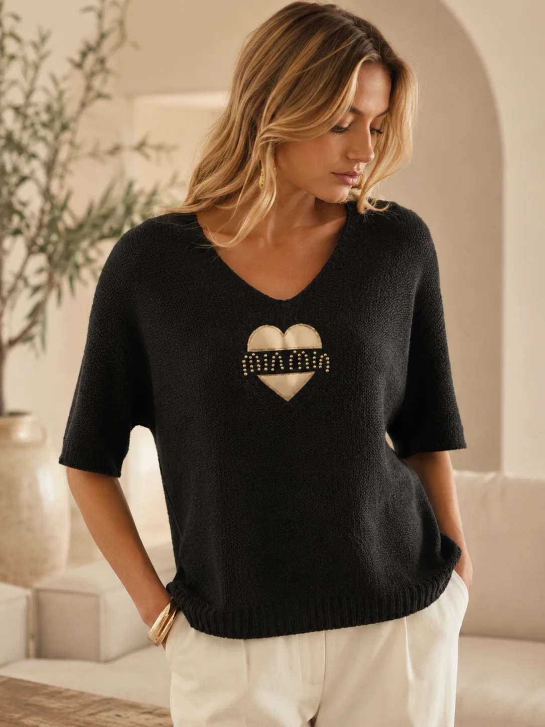 V-Neck with Gold Foil Heart collection — Modes Crystal Fashions Fall/Winter 2026, sizes XS to XXXL